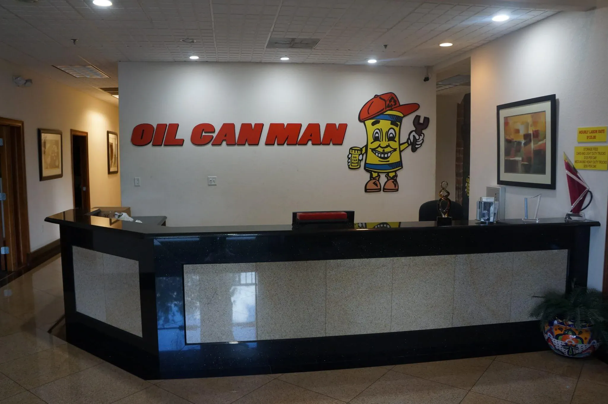 Oil can man front desk
