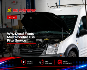 White Ford Transit cargo van undergoing maintenance inside a professional automotive repair shop. The vehicle’s hood is open, exposing the engine bay while a technician works nearby. Tools, equipment, and service supplies surround the workspace, highlighting a commercial fleet maintenance and repair environment.