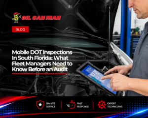 Automotive technician using a digital diagnostic tablet to inspect a vehicle engine in a professional repair shop, with the hood open and engine components visible during a maintenance and troubleshooting service.