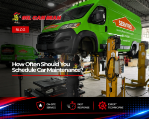 Mechanic servicing a commercial van on a lift during scheduled car maintenance at Oil Can Man in Fort Lauderdale, FL.