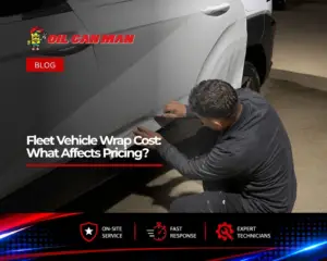 Technician professionally applying a white vinyl vehicle wrap to a commercial SUV, illustrating fleet branding installation and wrap preparation.
